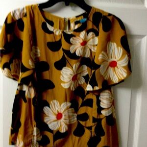 Eva Franco ruffle sleeve gold ground floral print. Size 6